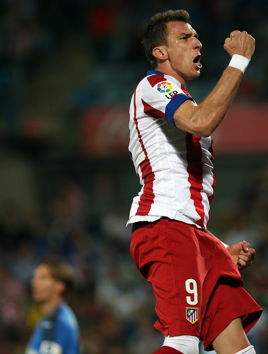 Temporada 14/15. Getafe - Atlético de Madrid. Mandzukic celebra con rabia su gol.