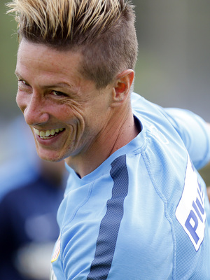 temporada 14/15. Entrenamiento en la ciudad deportiva de Majadahonda. Torres sonriendo durante el entrenamiento