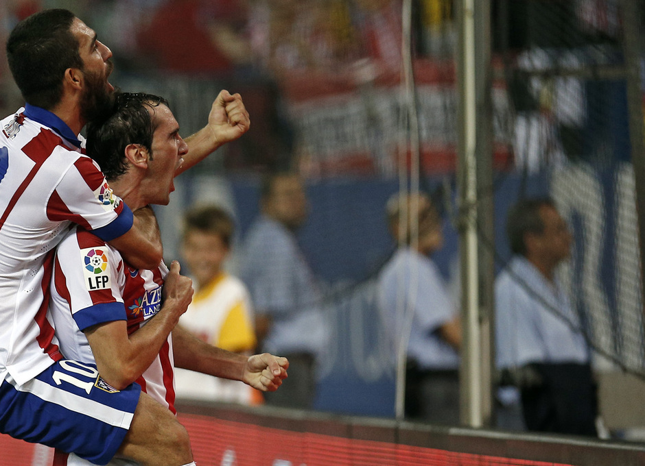 Temporada 14-15. Atlético-Celta. Godín y Arda celebran el segundo gol de nuestro equipo. Foto: Ángel Gutiérrez.
