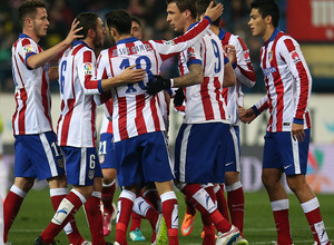 Temporada 14-15. 1/16 Copa del Rey. Atlético de Madrid-L'Hospitalet. Los jugadores celebran el primer gol.