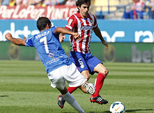 Temporada 2013/ 2014 Atlético de Madrid - Almería Tiago disputando el balón con Verza