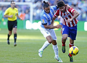 Temporada 13/14 Liga BBVA Málaga - Atlético de Madrid. Diego Costa se marcha con potencia.