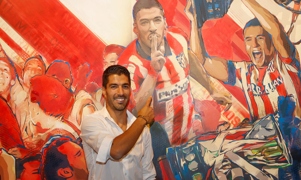 Luis Suarez makes Atletico Madrid smile